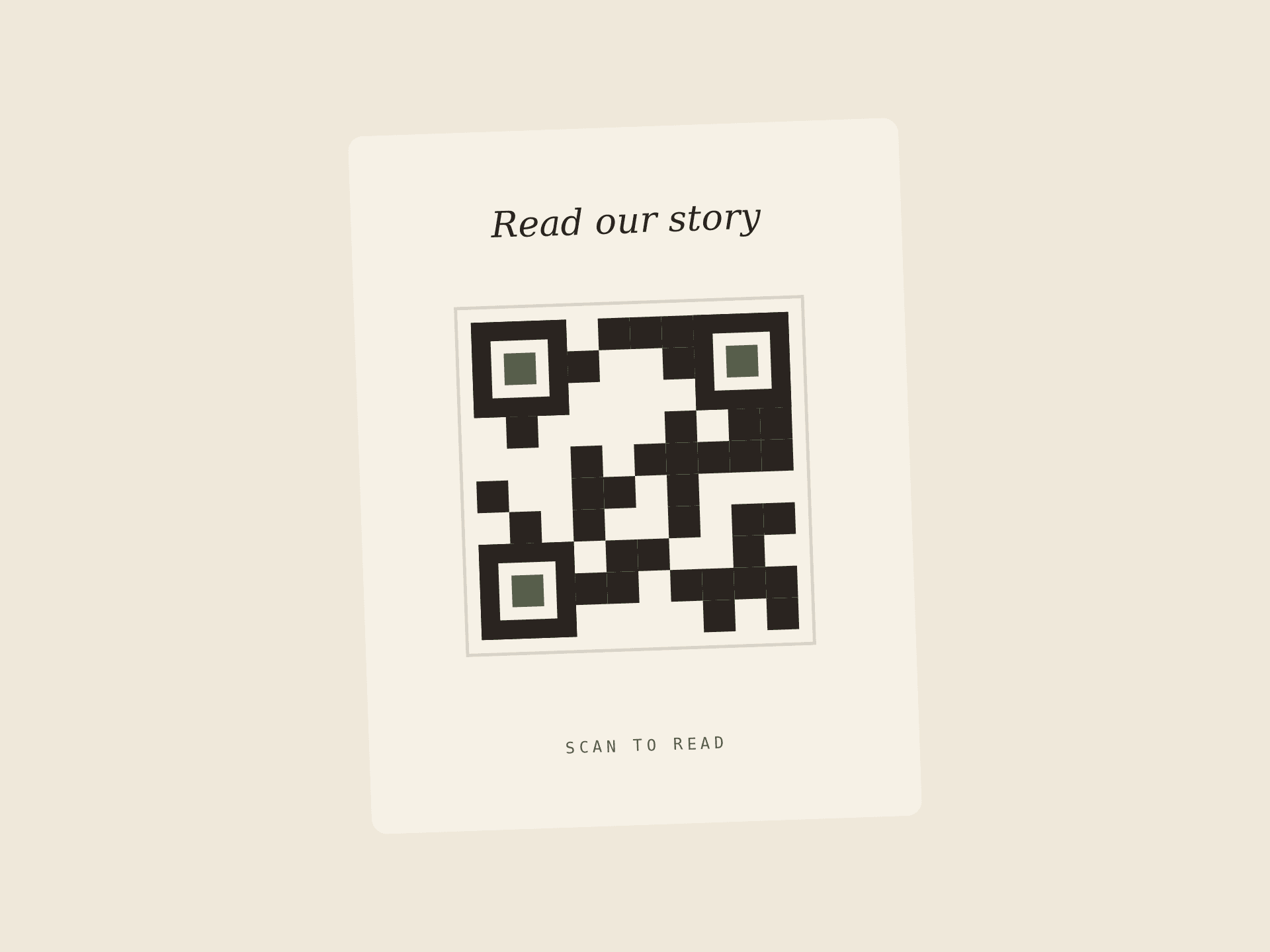 A keepsake card with a stylized QR code inviting guests to read the full story online.